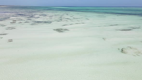 Aerial View of Low Tide in the Ocean Near the Coast of Zanzibar Tanzania Slow Motion