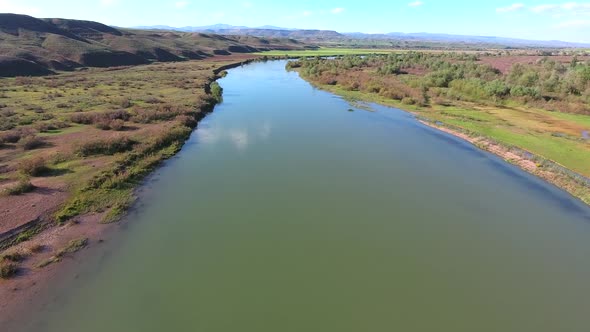 Long and Huge Big River in Vast Plain