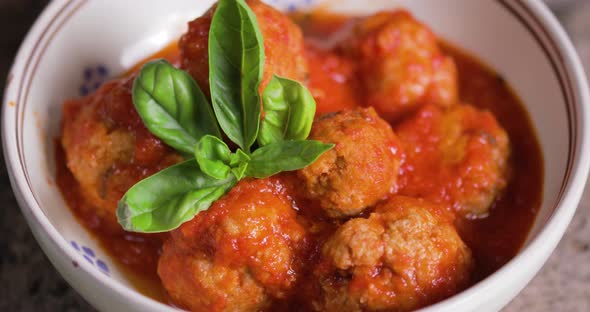 Meatballs with tomato sauce.