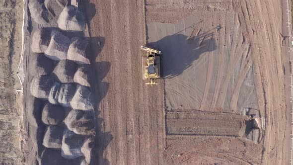 Bulldozer Using GPS Technology to Accurately Move Earth during Groundworks