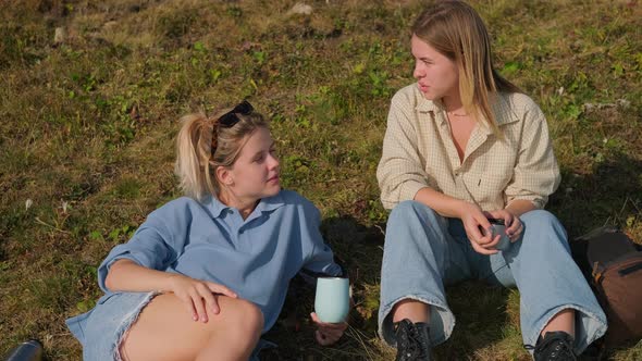 Teenager Girls are Resting at Nature