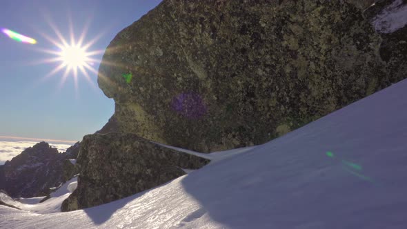 Sunny Day in Winter Alps Mountains with Big Rocks in Foreground. Travel Tourism Footage