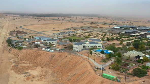 High aerial view of Kibbutz Yotvata, southern Arava, Israel showing modern buildings. This community