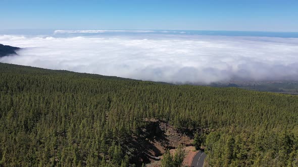 Amazing Flight Over the Clouds in Teide National Park, Tenerife, Canary Islands, Spain.Sunset Above