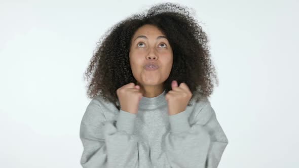 Excited African Woman Celebrating White Background