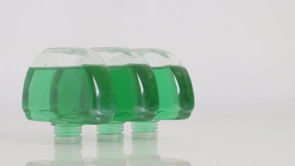 Green gel fresheners in a row 4K tilting video