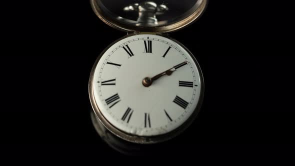 Old Vintage Clock Mechanism Watch Time Going Fast . Black Background. Time Lapse