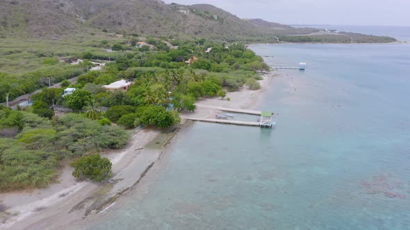 Lush Green Coastline Of Ocoa Bay And The Caribbean Sea In Azua, Dominican Republica. aerial drone, a