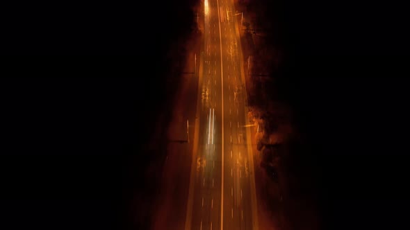 Long Road Highway with Many Cars at Night Filmed in Hyperlapse on a Bridge