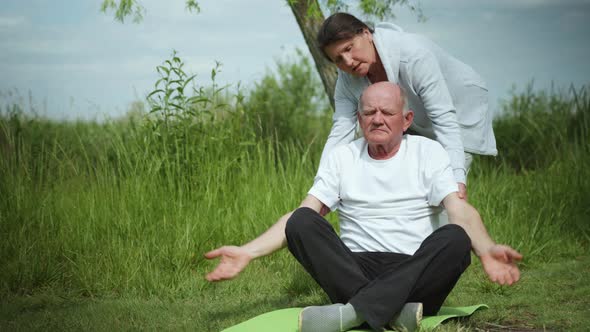 Health Care, Elderly Woman and Man Pensioners Lead a Sporty Lifestyle and Perform Physical Exercises