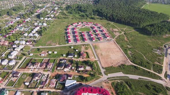Aerial View of New Modern Cottages Townhouses in a Suburban Settlement