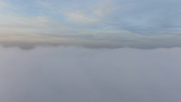 AERIAL DRONE SHOT Smooth Flight Over the Clouds Under the Sky Fluffy White Mist