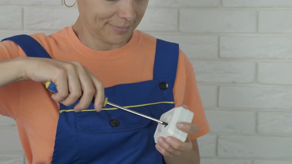 Woman with Electrical Sockets.