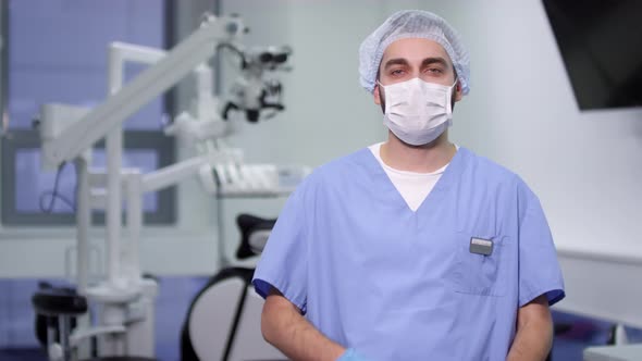 Male Dentist in Uniform Posing for Camera