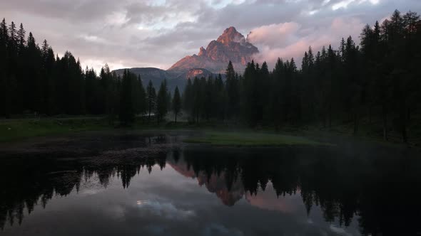 Mountain lake in the Dolomites with Tre Cime di Lavaredo reflection