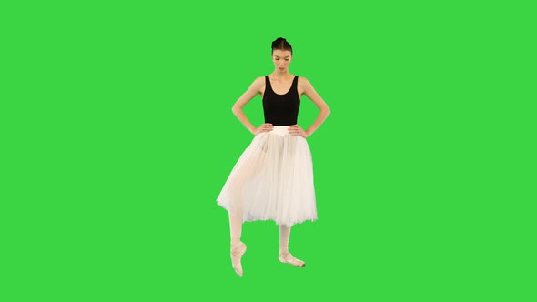 Young Professional Ballerina Making Warmup on a Green Screen Chroma Key