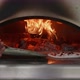 Putting a Pizza in Woodfired Oven - VideoHive Item for Sale