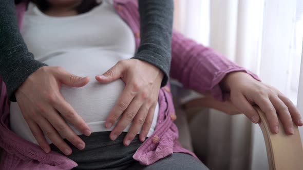 Pregnant Couple Feels Love and Relax at Home