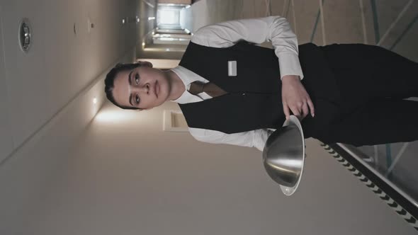 Waitress Serving Food to Guest in Hotel Room