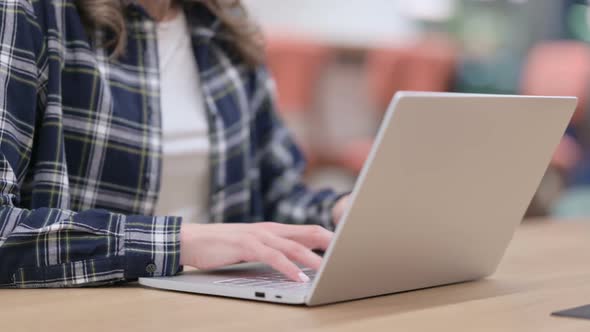 Female Hands Showing Disappointment While Using Laptop