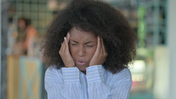 Exhausted African Woman Having Headache