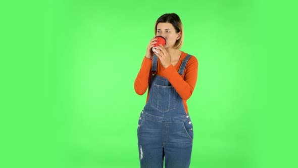 Girl Drinks Unpalatable Coffee and Is Disgusted on Green Screen