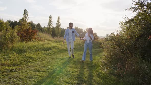 Romantic Couple Walking in Park