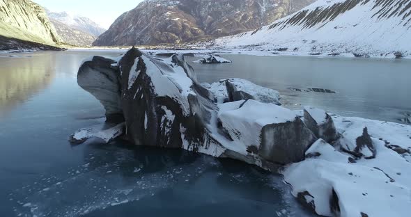 Drone flying over glacier lagoon in Tibet,China.Aerial view drone footage 