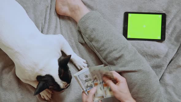 Close Up Man Holding Cash at Home