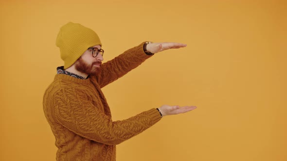 Young Attractive Handsome Smiling Man in Casual Clothes Posing Isolated on Yellow Background Studio