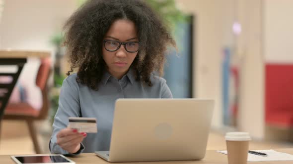 Online Shopping Payment Failure on Laptop By African Woman