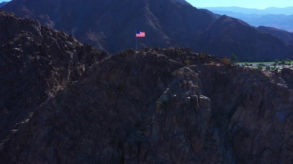 American patriotism flag standing tall waving at Indio California