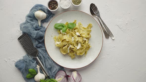 Hot Tasty Tagliatelle Pasta with Basil and Green Pesto