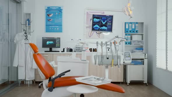 Zoom in Shoot of Stomatology Orthodontist Office Room with Tooth Xray Images on Monitor