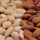Almond nuts rotating close up.  Abstract background of organic ecological almond nuts. - VideoHive Item for Sale