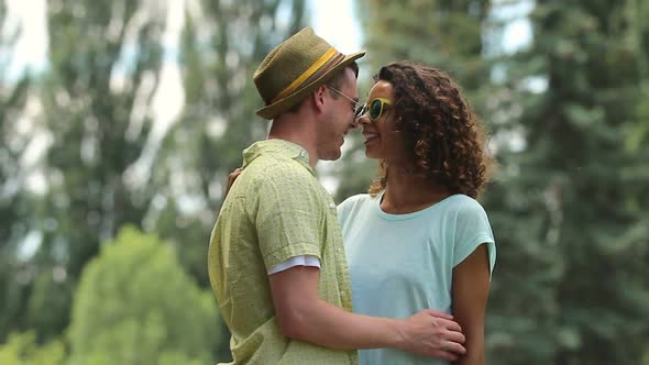 Joyful Couple Dancing and Hugging, Gently Touching Each Other With Their Noses