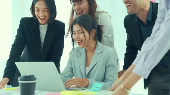 Business People Proficiently Discuss Work Project While Sitting in Circle