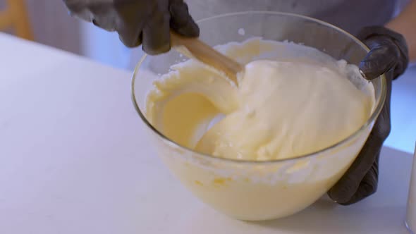 Hand Mixing Bread Dough. Pastry Cooking Process.