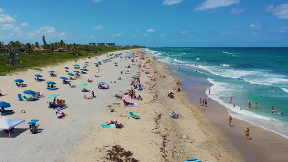 A crowed beach in South Florida