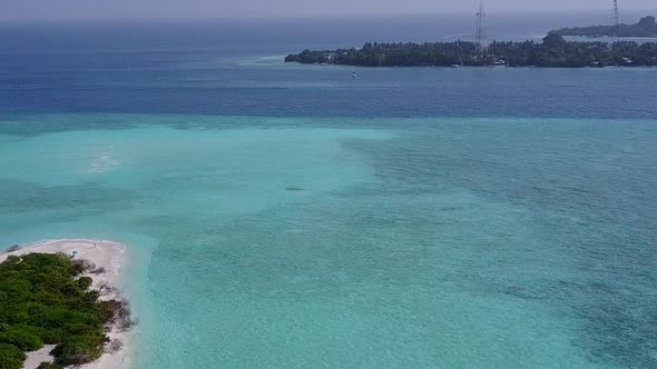 Aerial drone tourism of lagoon beach journey by water with sand background