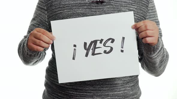 A person holding a sign with the message and the word yes!