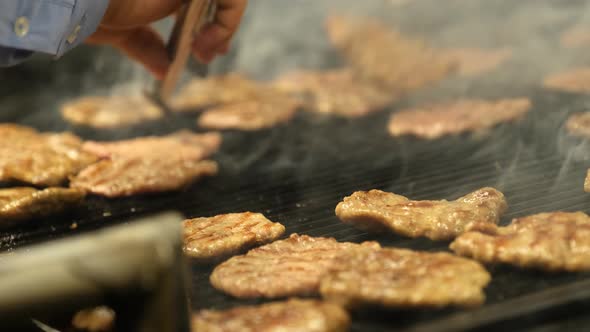 Cooking Cow Meatball Food on a Barbecue Wood Fire