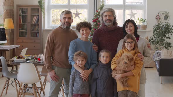 Big Family Posing at Home on Christmas