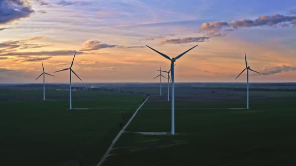 Aerial view of stunning wind turbines at dusk, Poland