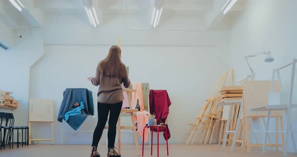 Young Girl Paints a Still Life From Nature at the Easel