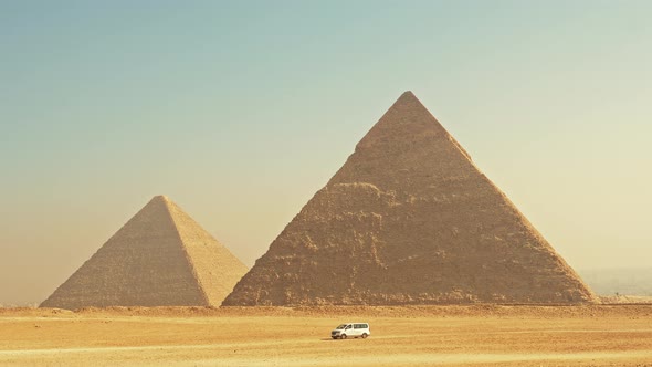 Tourist Bus Drives to Pyramids on Giza Plateau
