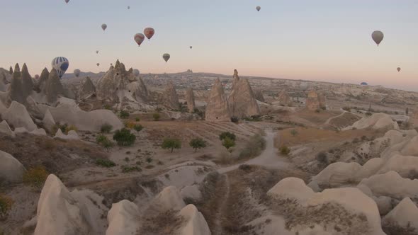 Cappadocia Aerial Shot of Rock Chimneys and Uchisar Castle in Goreme Turkey