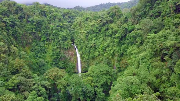 Aerial view of the landmark La Fortuna Waterfall in the Costa Rica rainforest