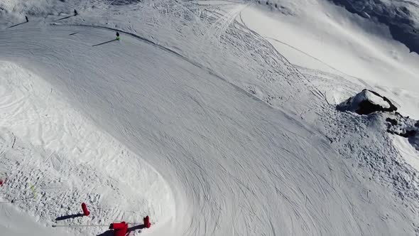 Aerial View of the Alps Mountains in France. Mountain Tops Covered in Snow. Alpine Ski Facilities