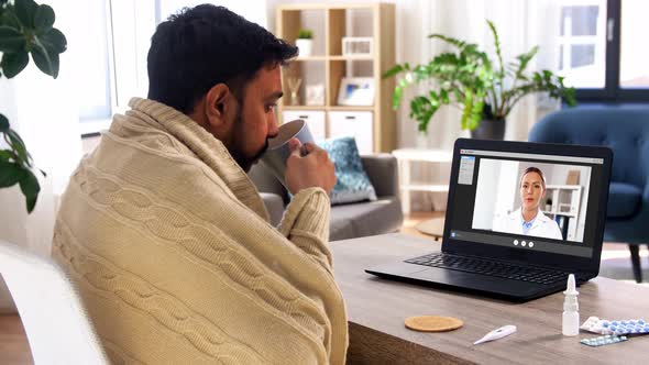 Sick Man Having Video Call with Doctor at Home